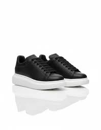 Alexander McQueen Oversized in black with a white sole